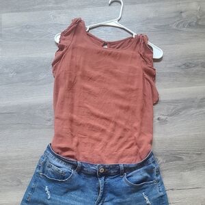 Sleeveless ruffle blouse